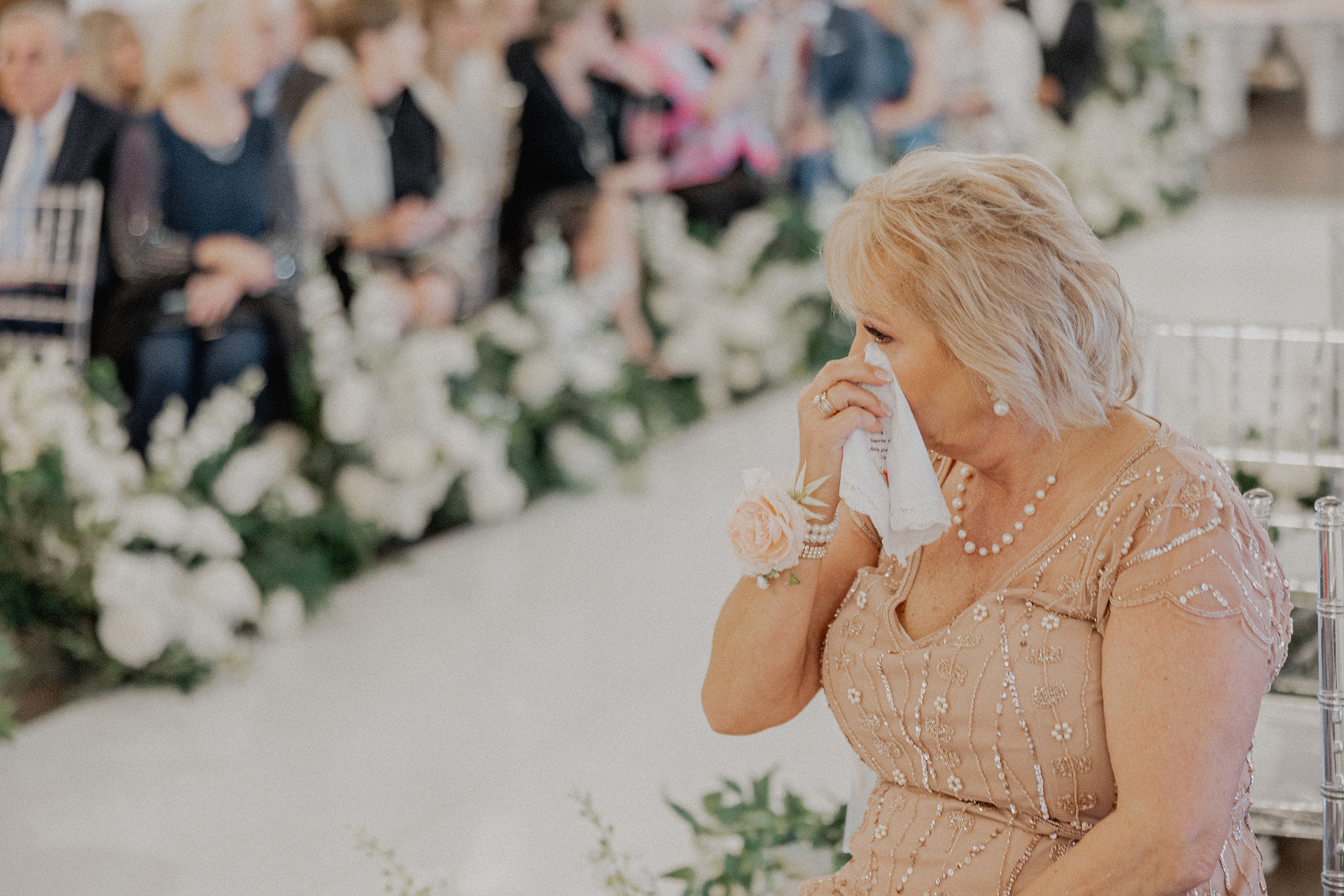 Mother crying during ceremony