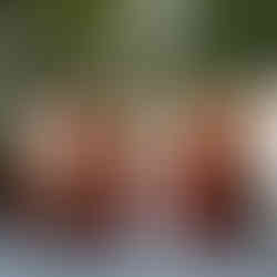 Bride standing with bridesmaids