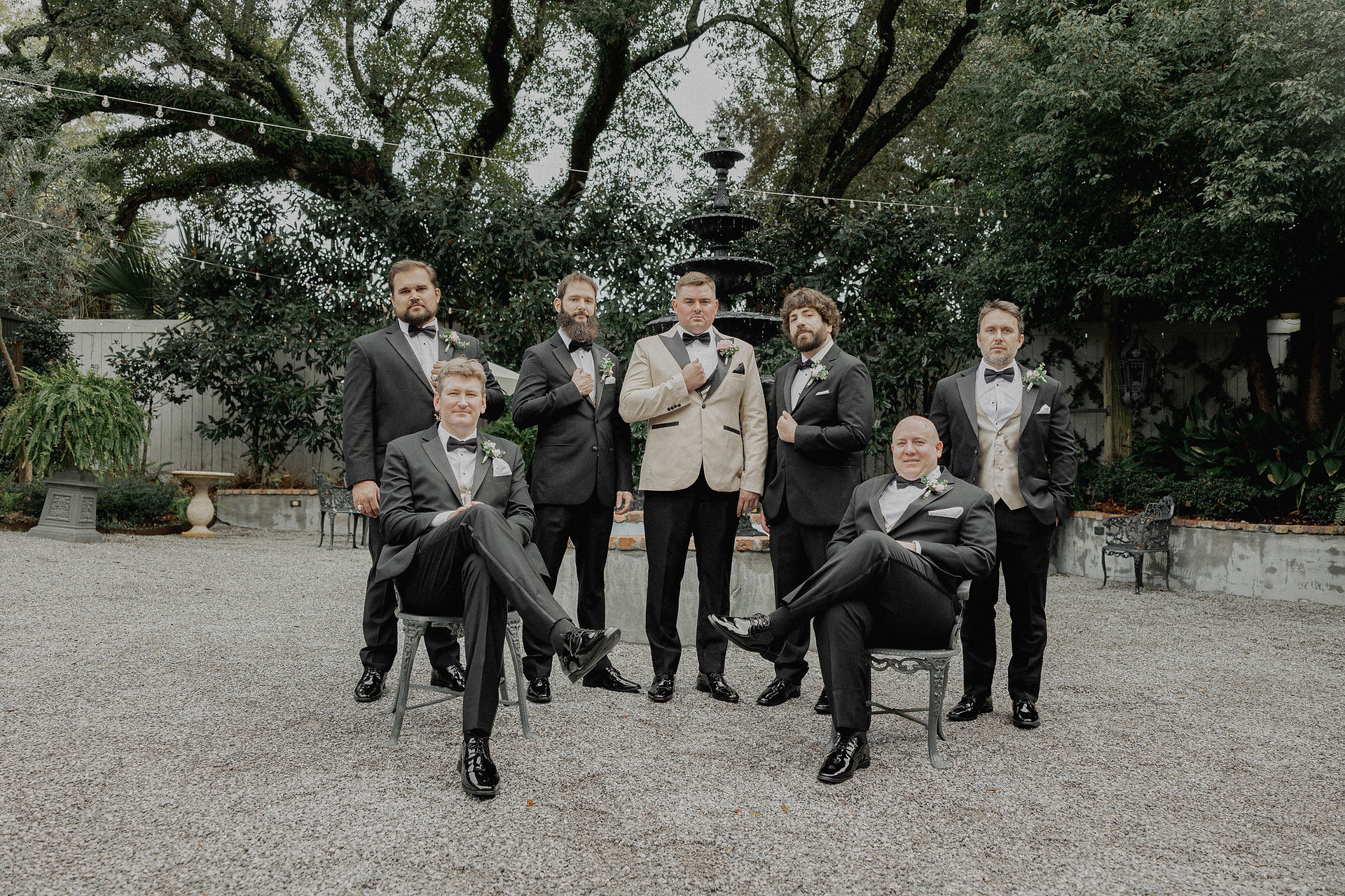 Groom posing with groomsmen