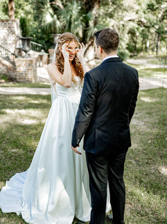 Bride crying while seeing bride