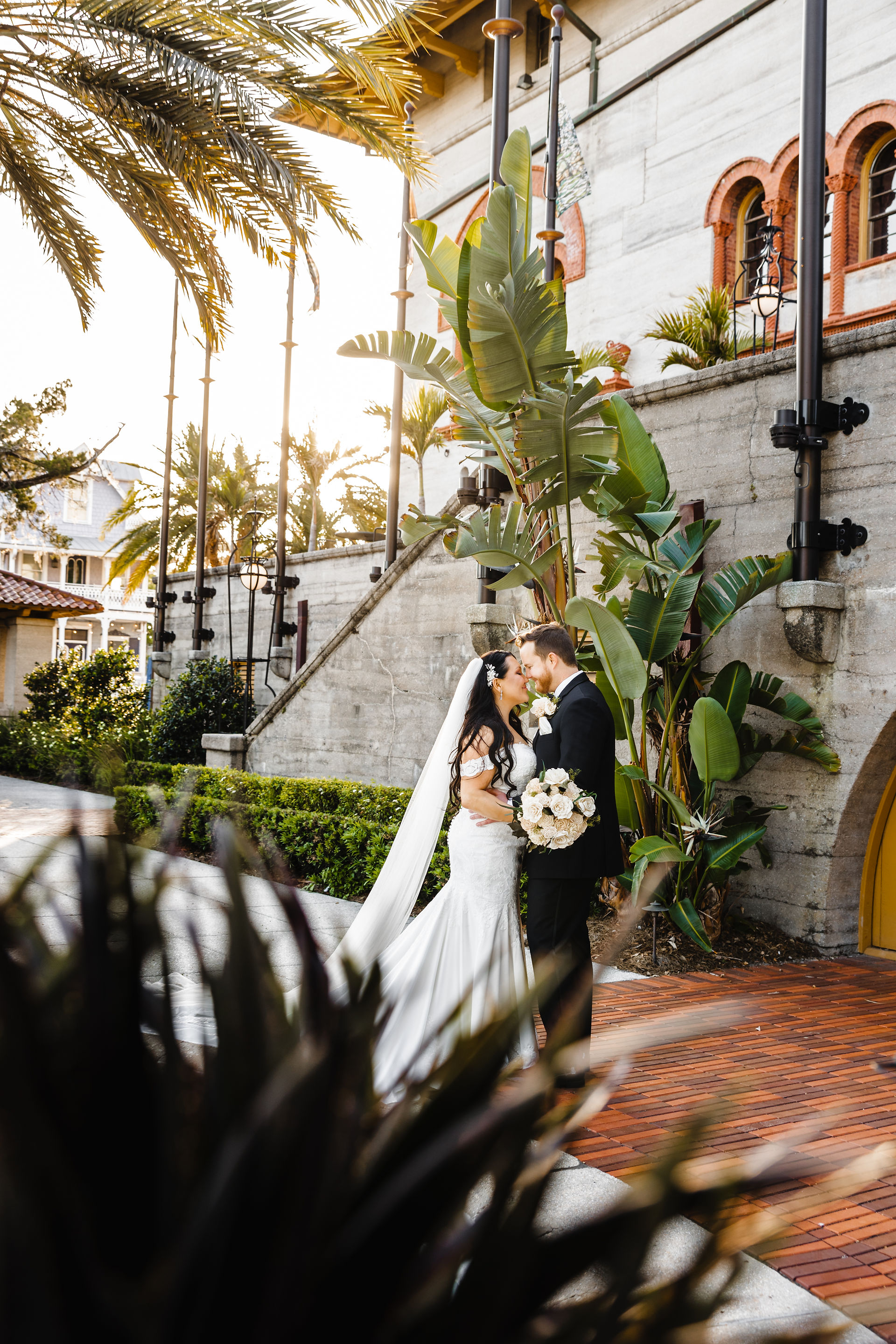 Bride and groom kissing