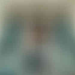 <an holding and kissing girl in Downtown Pensacola.