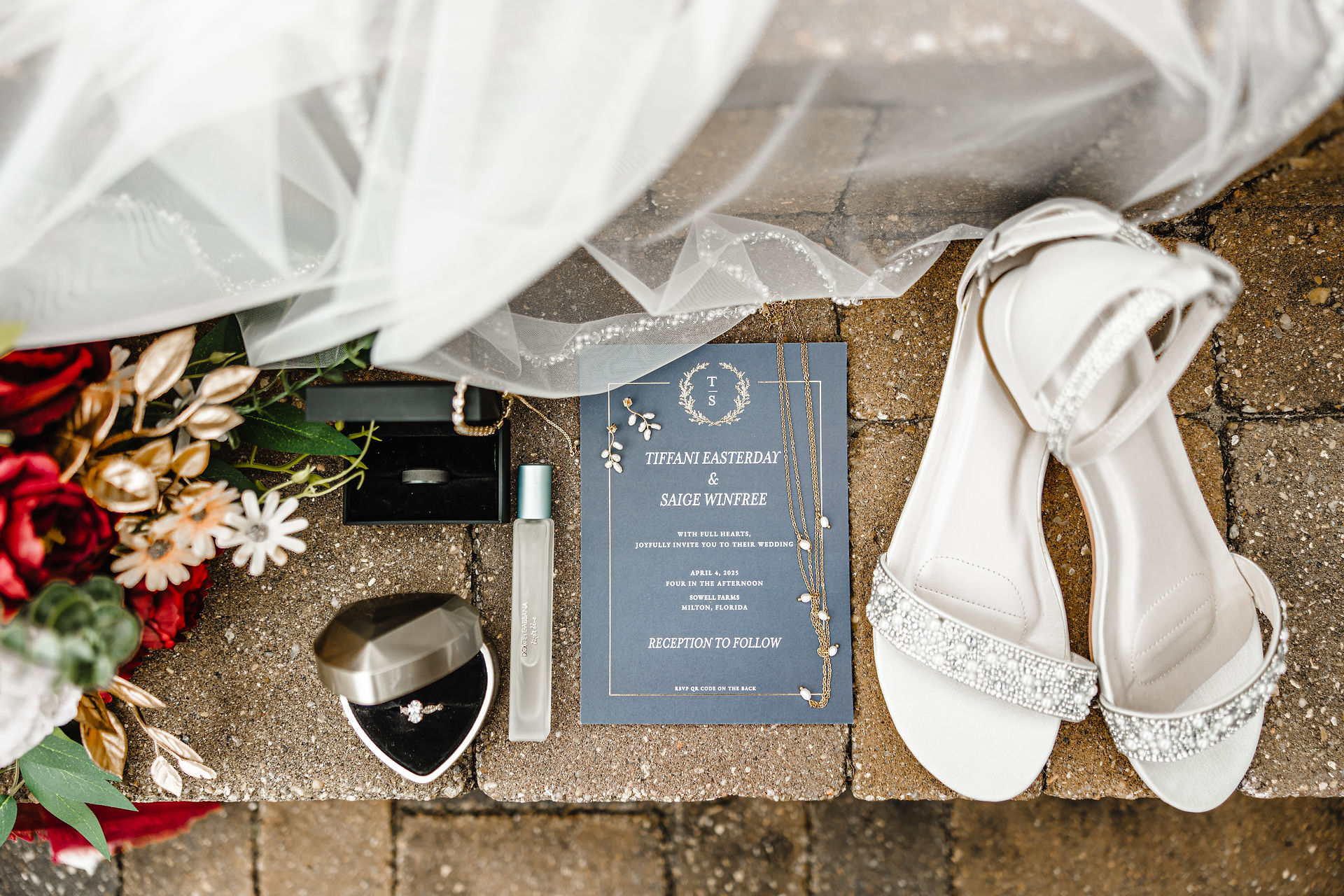Wedding details on ground.