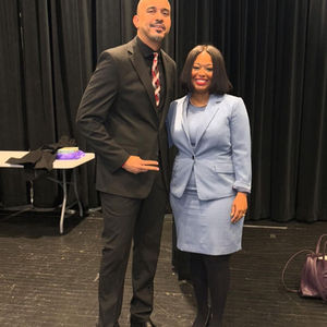 Peace For DC Executive Director Marcus Ellis poses with keynote speaker