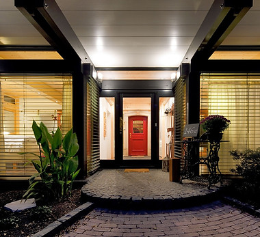 House with Red Door and entryway lighting
