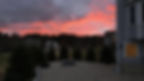 Paver patio with fire pit at sunset