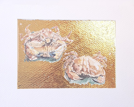 Deux crabes en or