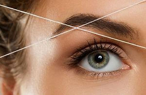 Missoula Brow Shaping Treatment removing unwanted hairs from eyebrows.