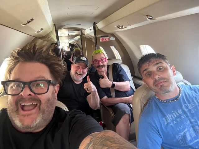 Bowling For Soup and crew on board a private jet