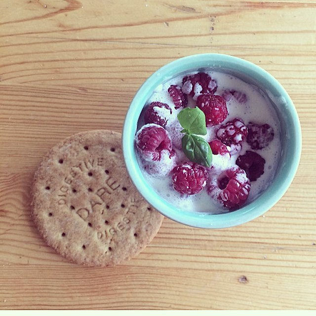 Raspberries from our backyard, a little cream and a good old wheat cookie
