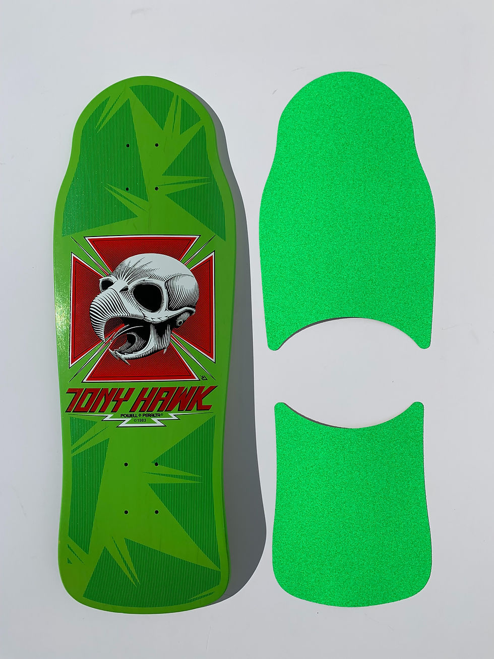 Thumbnail: top view of Skateboard deck by Powell Peralta Tony Hawk series 15 with die-cut Style Grip tape laser cut by Rough GT in green