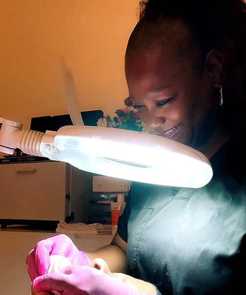 Cheryl performing facial with extraction