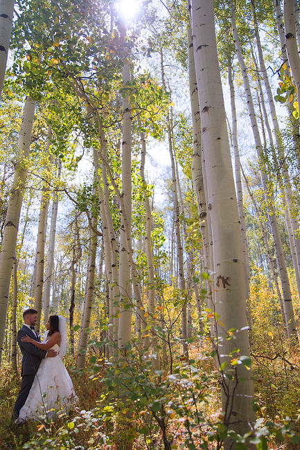 Bride and groom in forest