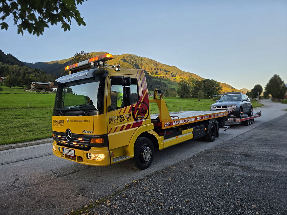 Fahrzeugüberstellung mit Abschleppwagen und Anhänger im Pinzgau - M&S Abschleppdienst