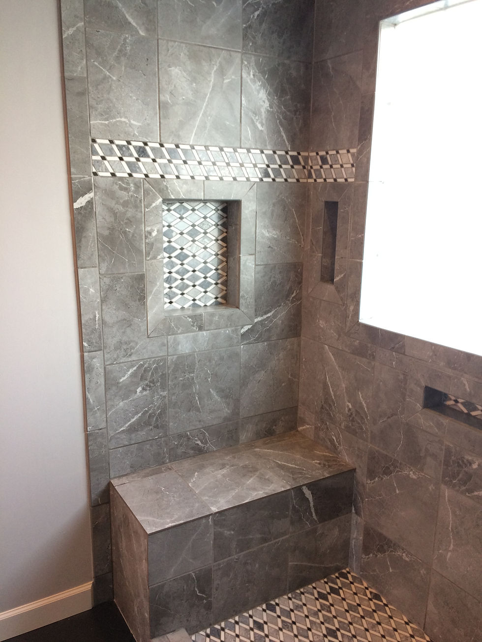 floor tile in the back of the niches
