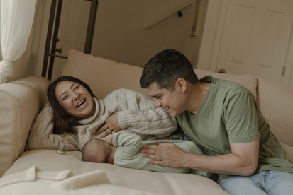 Candid family moments captured indoors, highlighting love and connection