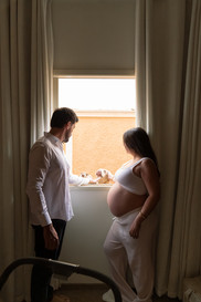 Candid family moments captured indoors, highlighting love and connection