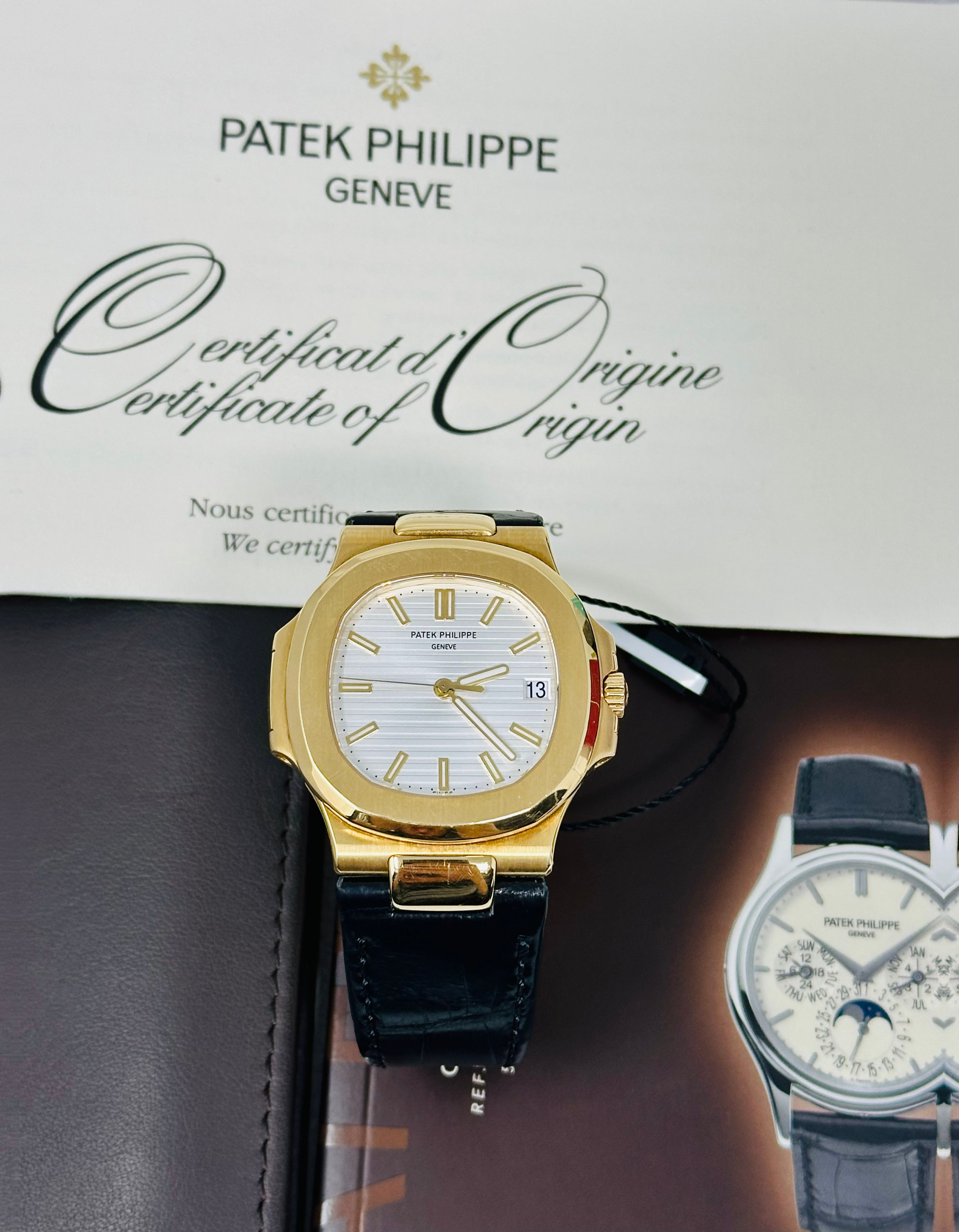 Patek Philippe Nautilus 5711J-001 Yellow Gold Box & Papers