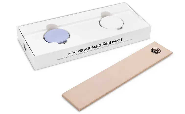 Miniaturbild: HORL Premiumschärfe Set – in einer weißen Verpackung, im Vordergrund liegt das Abziehleder