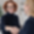 Sabina Professional handshake in modern office.png