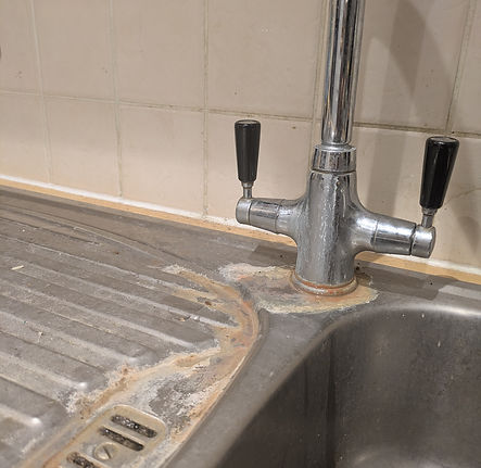 Shower tap buildup_edited.jpg