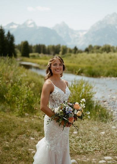 Close-up portrait of an elopement bride with soft, romantic details in a natural outdoor setting