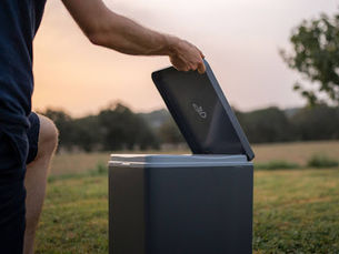 a scenic view of a man opening up a trelino toilet