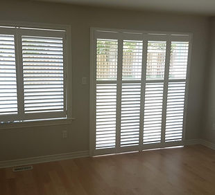 Shutters in a patio door and side window
