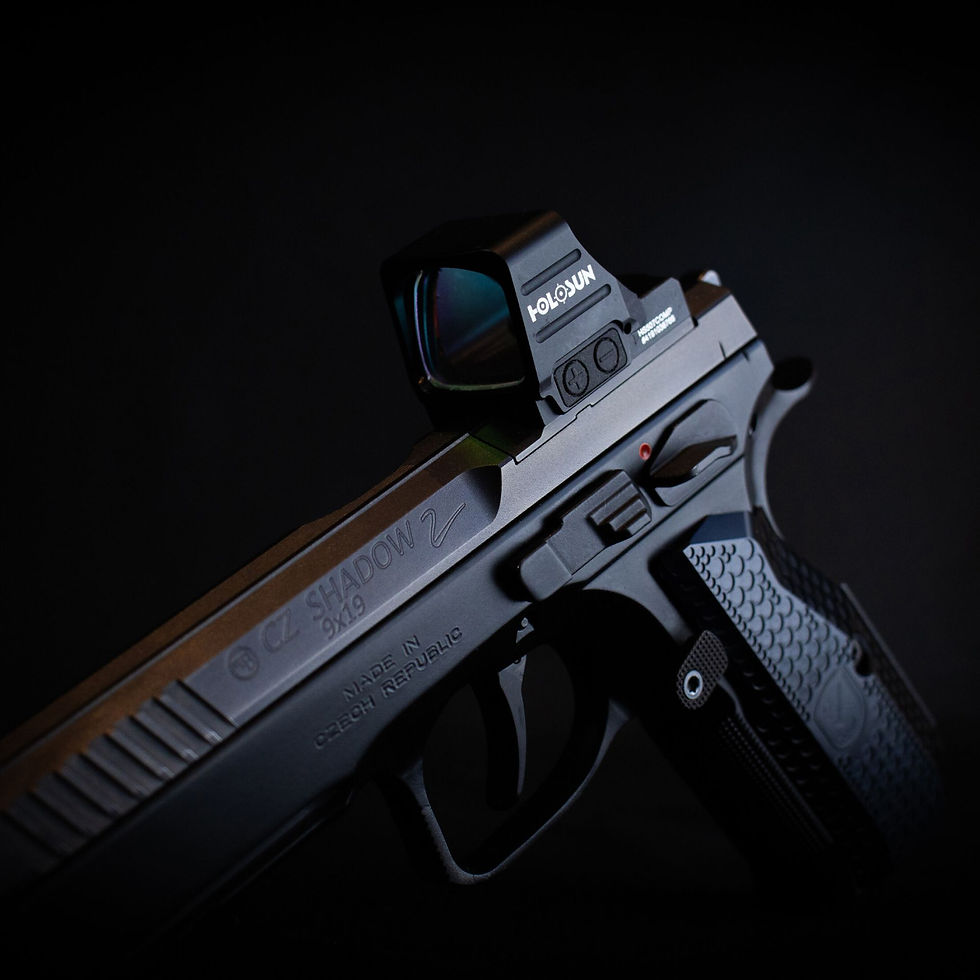 Miniaturbild: Holosun HS507COMP-RD Rotpunktvisier montiert auf einer Pistole