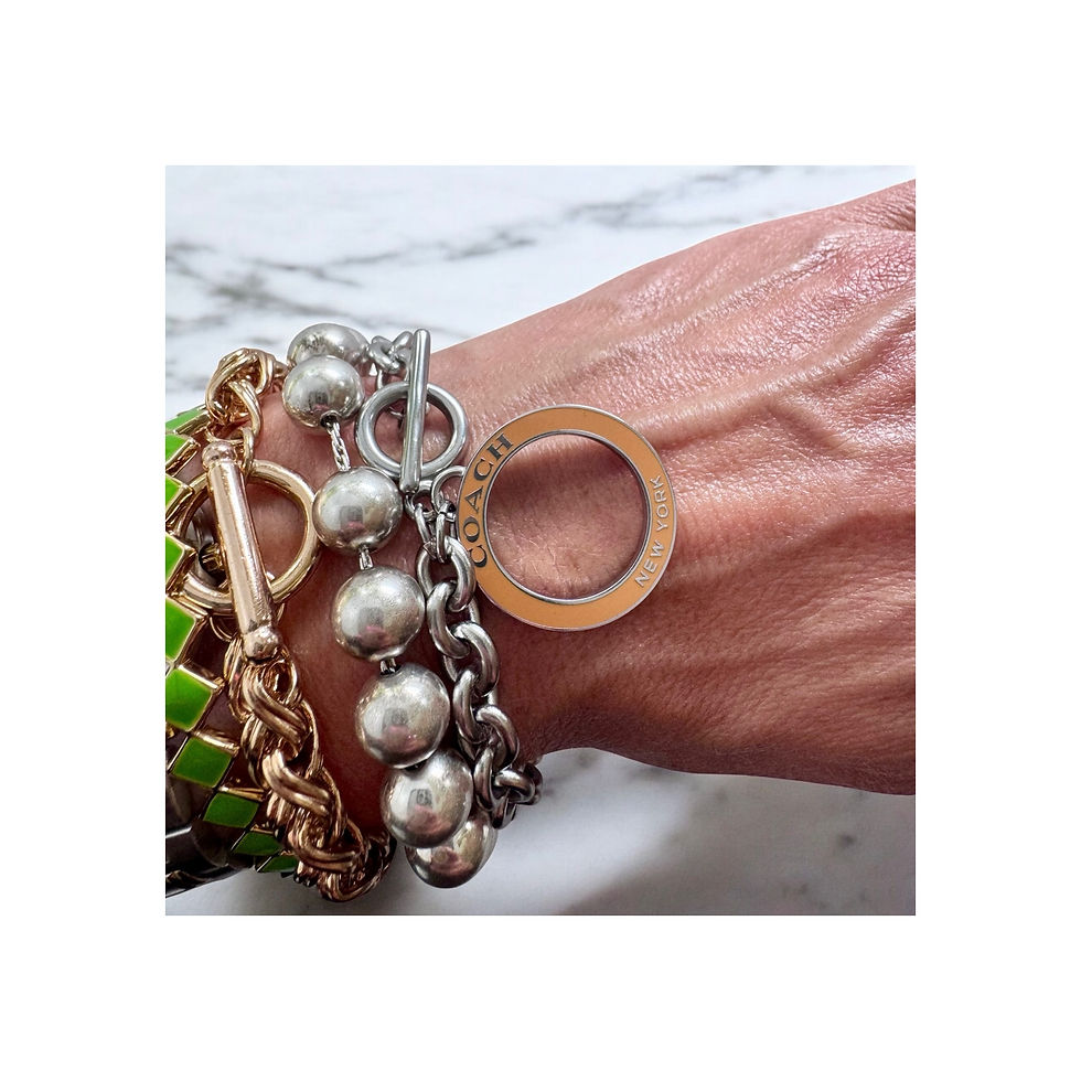 Thumbnail: Repurposed Coach Large Silver & Orange Logo Charm Bracelet