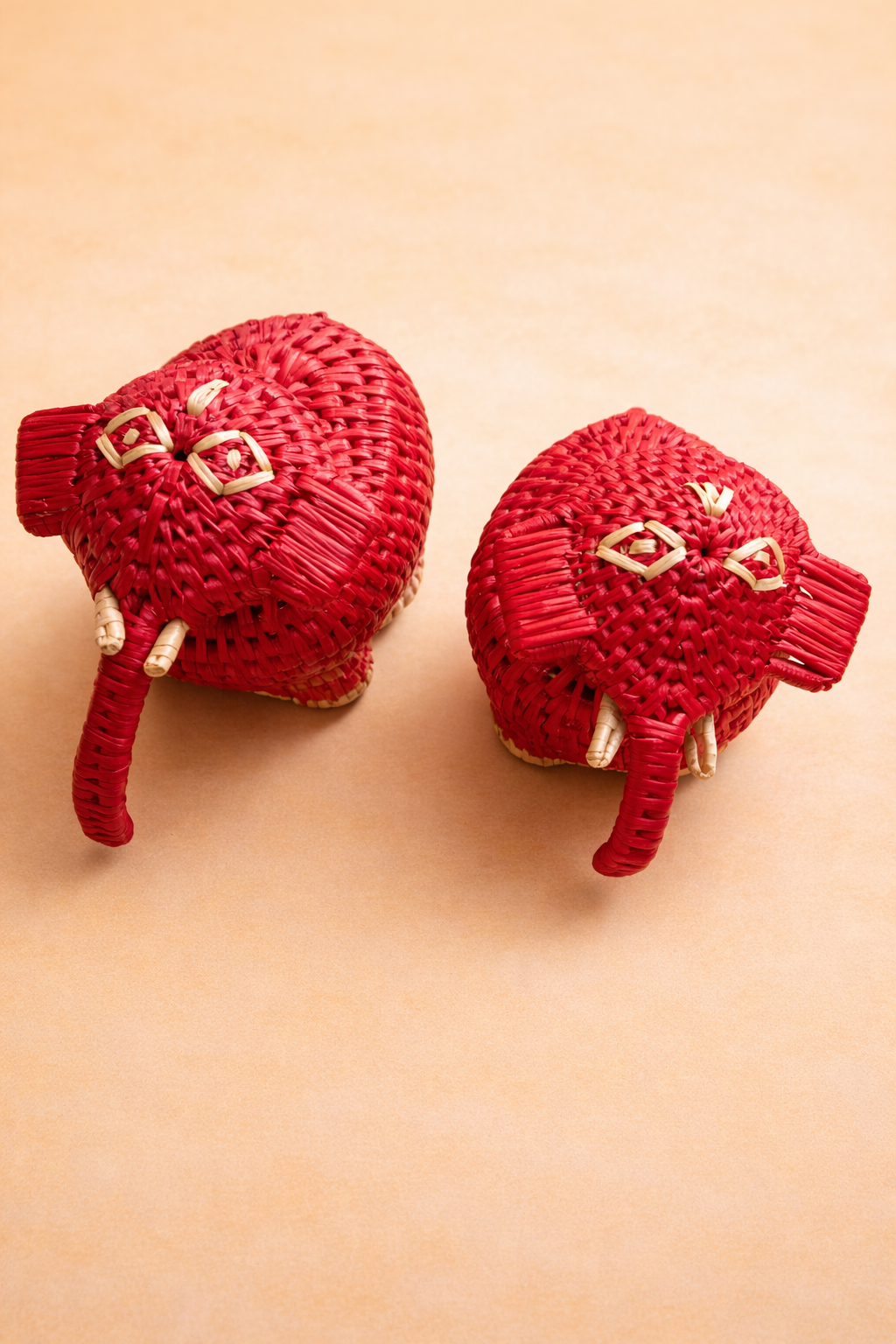 A Red Pair of Handcrafted Red Elephant 