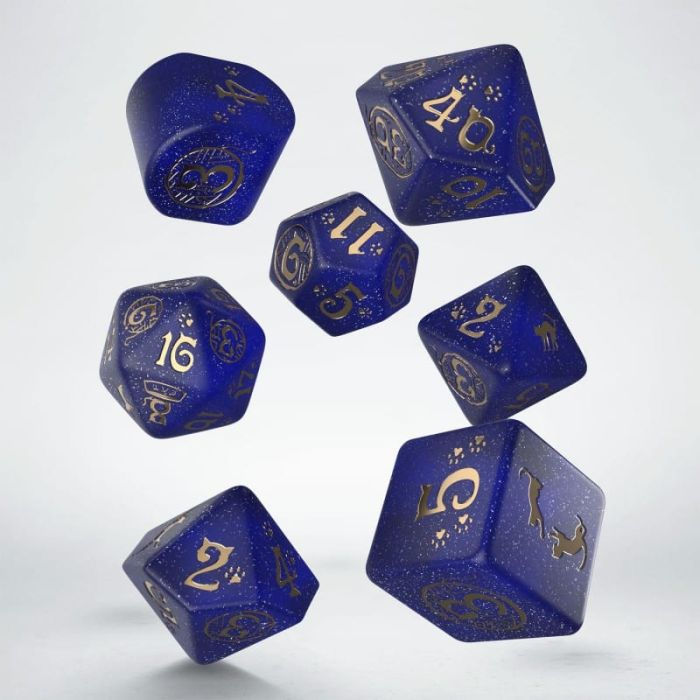 Dadi da gioco blu con numeri dorati 40, 11, 16, 2 fluttuanti.