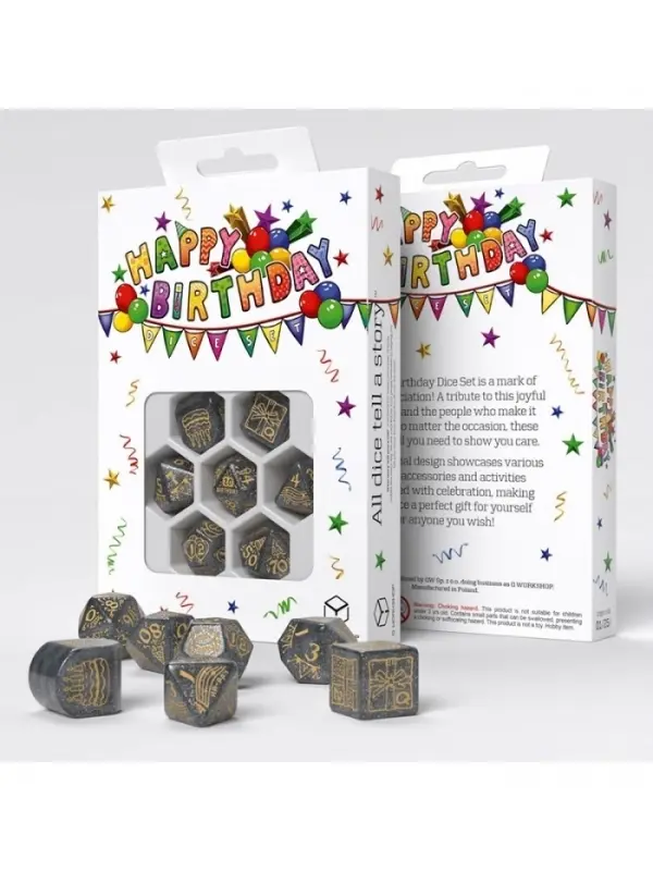 Due scatole regalo con scritta "HAPPY BIRTHDAY" e cubi metallici sparsi.