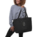 Smiling woman holds black tote bag, "YOU ARE A GARDEN GROW GOOD THINGS"