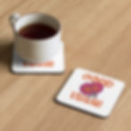 White square coasters, GOOD VIBES text, one with a full tea mug.