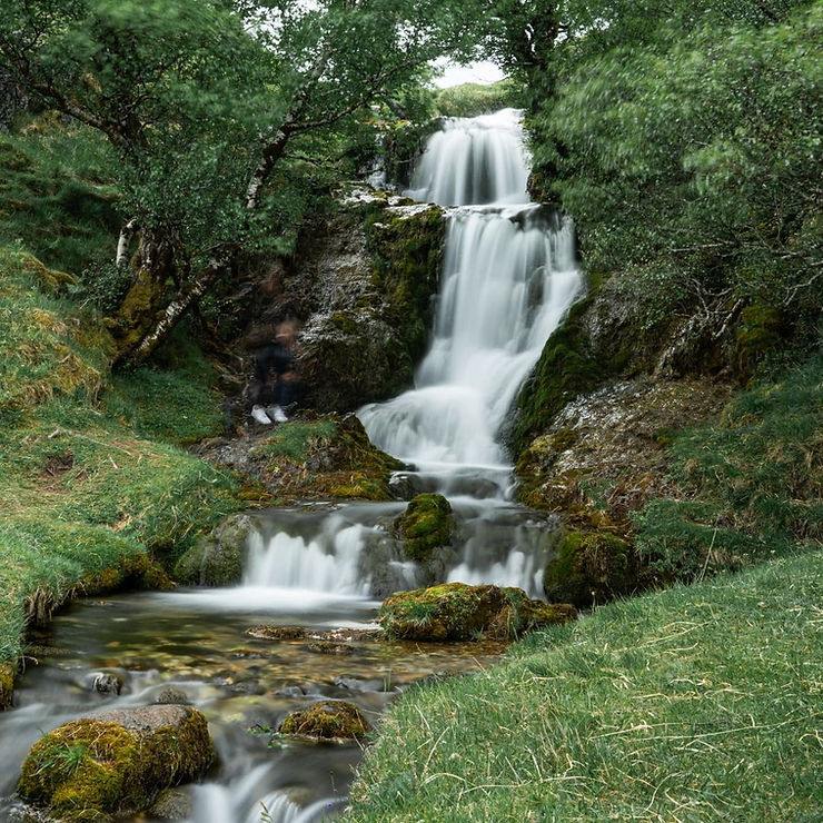Image of Ardvreck Castle Waterfall in Scotland.