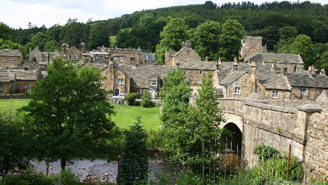 This is the fairytale village of old stone set within a woodland cloak