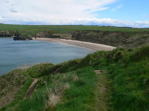 Unique and special beach where the sand squeaks as you walk beside crystal-clear water