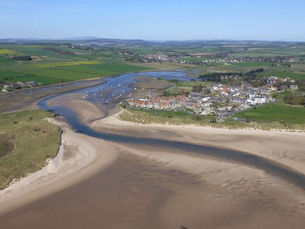 Beautiful coastal village close to a popular resort with a beach that feels completely calm