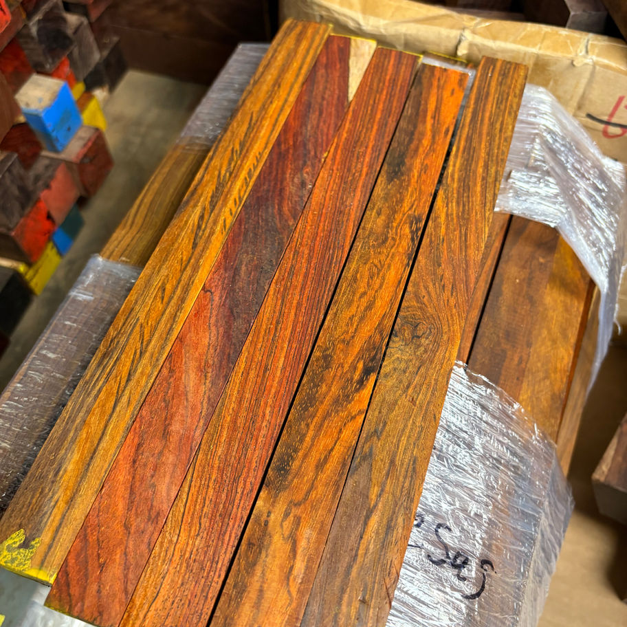 Planks of Highly Figured Mahogany Lumber ready for shipment, Diamond Tropical Hardwoods.