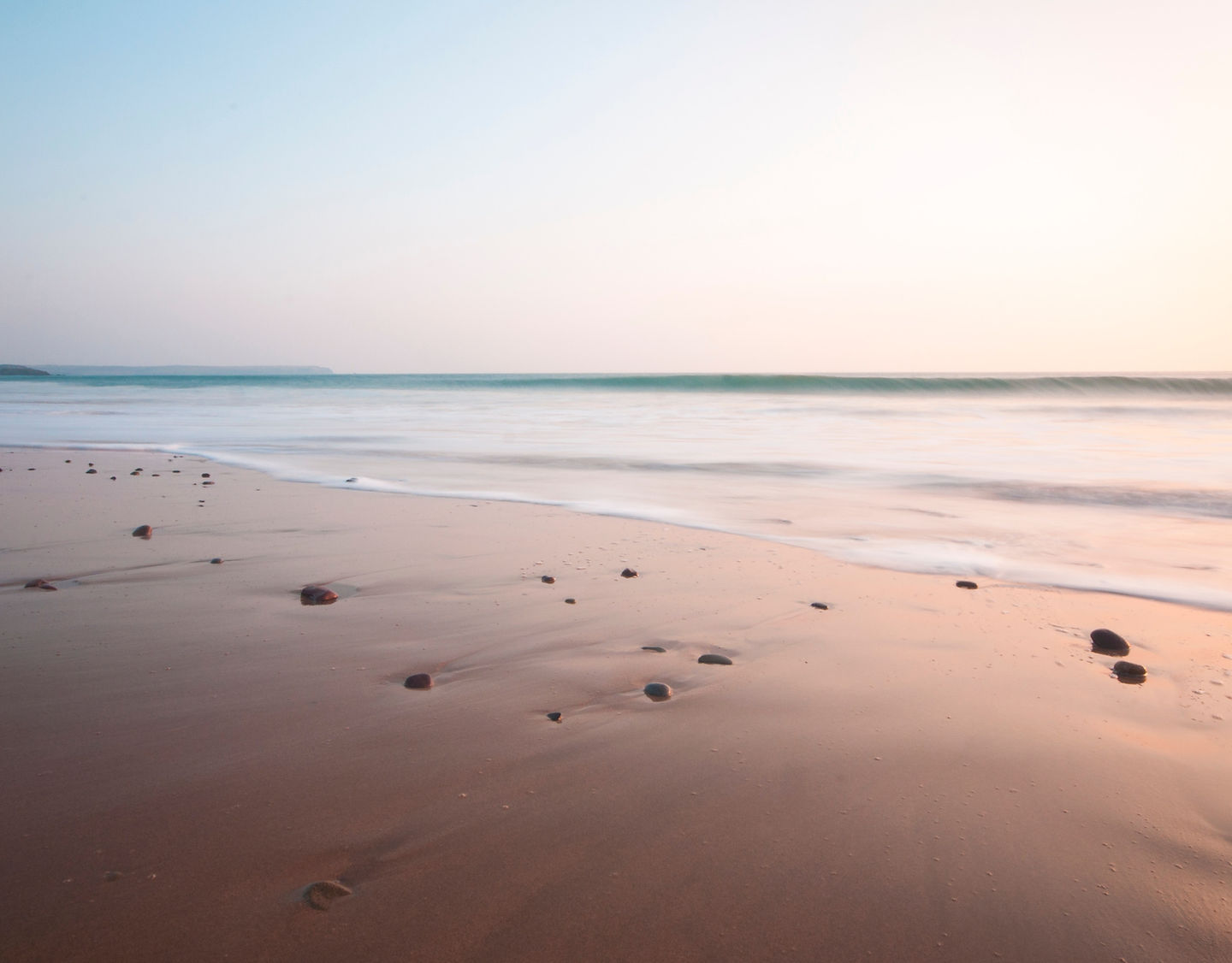 Plage au coucher du soleil