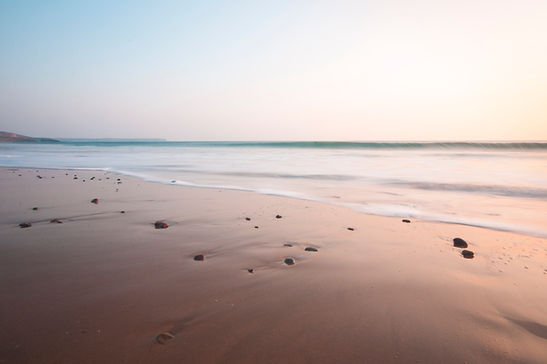 Plage au coucher du soleil