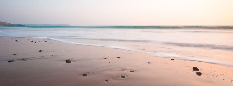 Plage au coucher du soleil