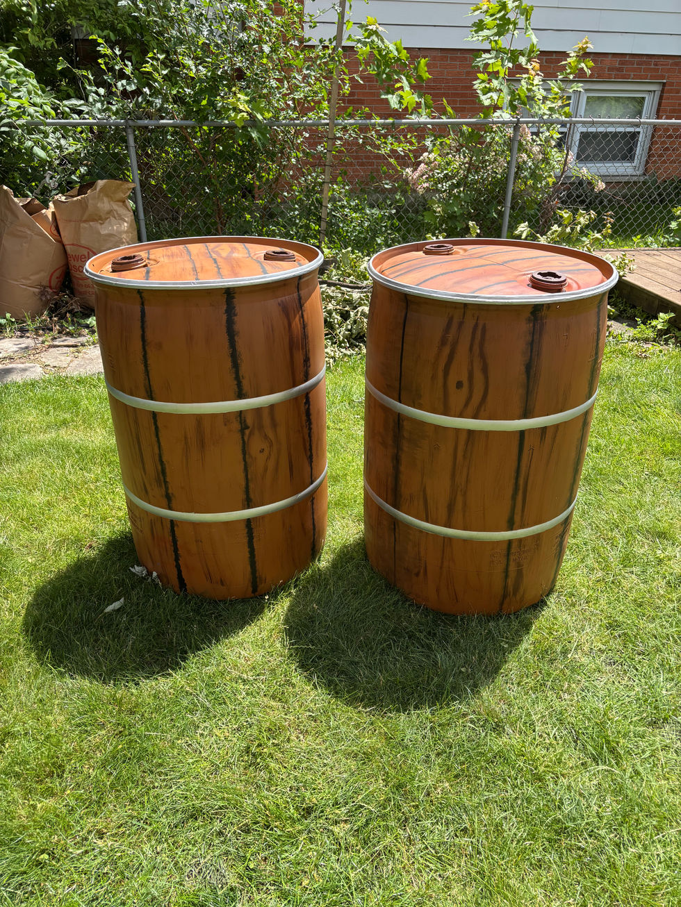 Blue rain barrel, spray paint, acrylic paint and matte top coat