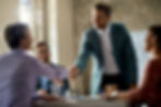 business-coworkers-shaking-hands-meeting-office-focus-is-businessman.jpg