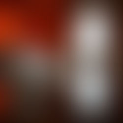 Aesthetic photo collage featuring three artistic book-themed images. The first image shows an open book on a polished table in a warmly lit room, with candles and a large arched window in the background. The second image displays a closed black book titled “The Book and The Author” beside a glass figurine, surrounded by soft candlelight. The third image is an illustrated design of an open book with a glowing flame above it and the title “The Book and The Author – Reflections of the Same Soul.”