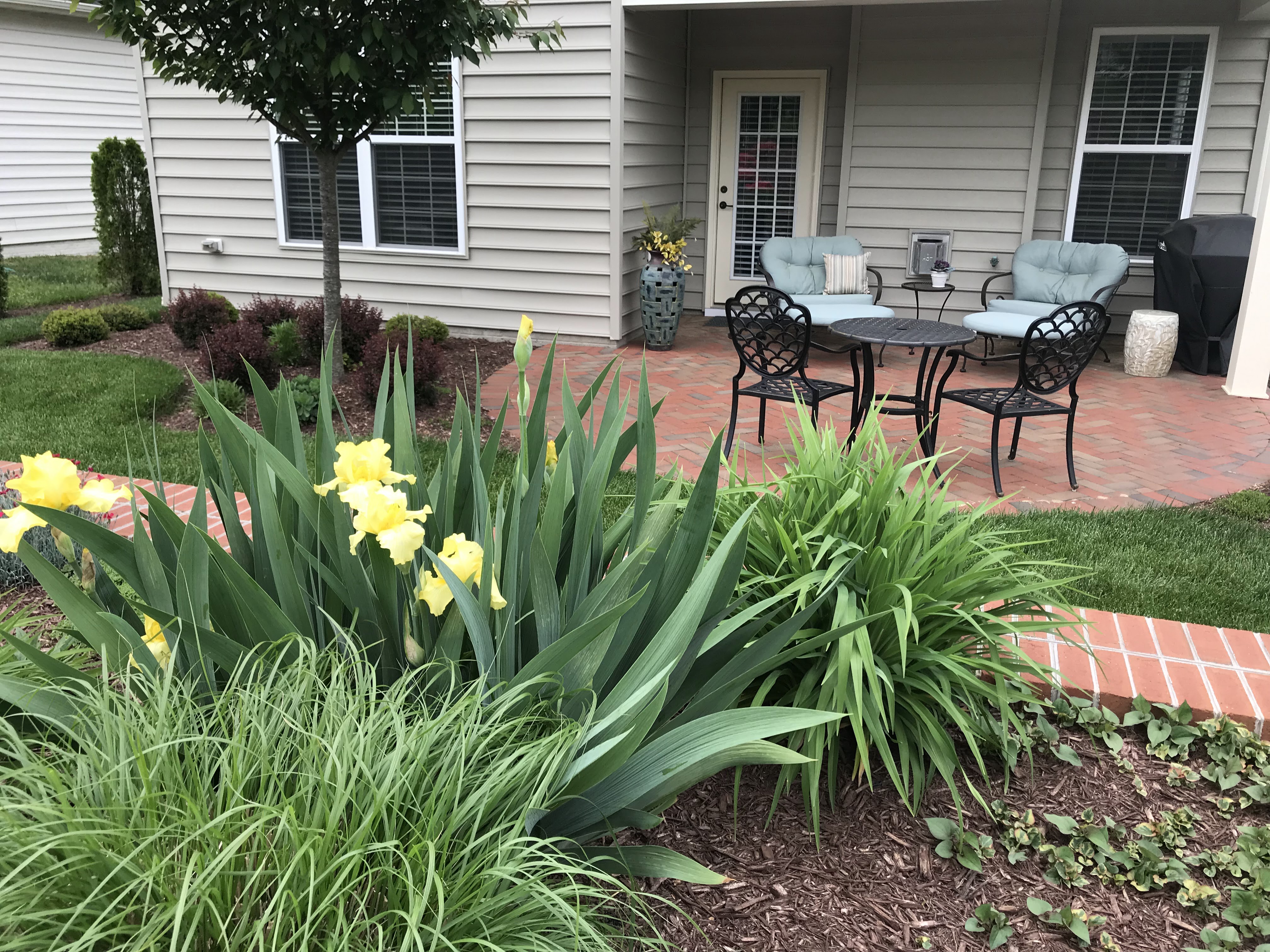 Cozy, private garden patio enjoyed inside and out.