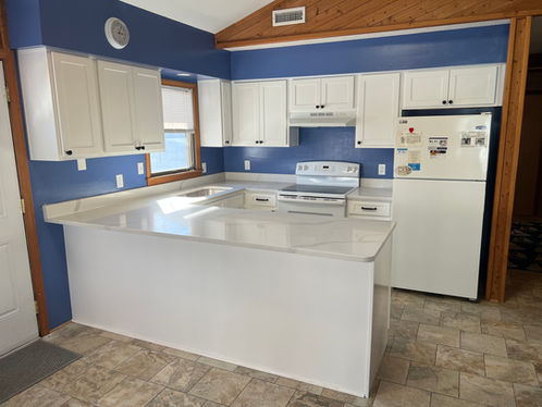 White Shaker Cabinets and White Quartz 