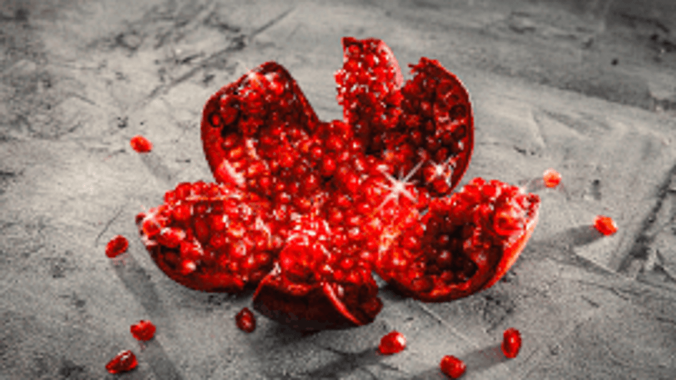 Juicy fruit GIF photography on a grey background by Krisztian Studio - London.