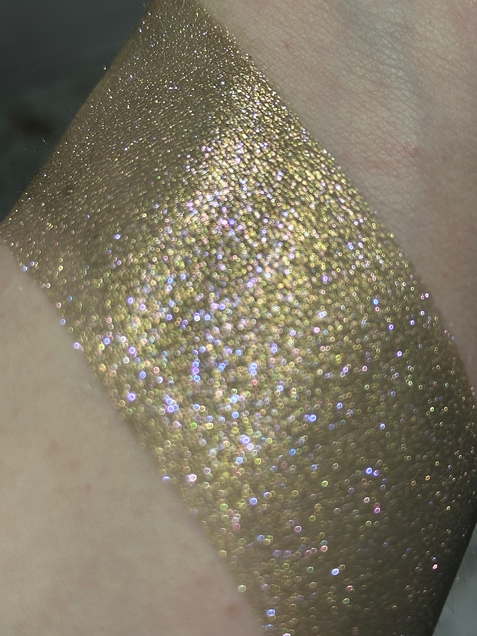 Thumbnail: Glittery eyeshadow swatch on skin. Under the Moon - Gloomy Glow Highlighters - Vegan.